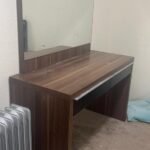 brown wooden dressing with big mirror